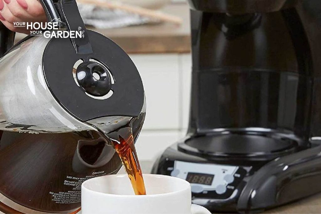 pouring coffee from a coffee maker